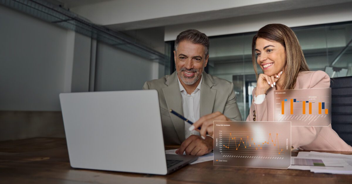 Female business manager consulting male client at office meeting with laptop.